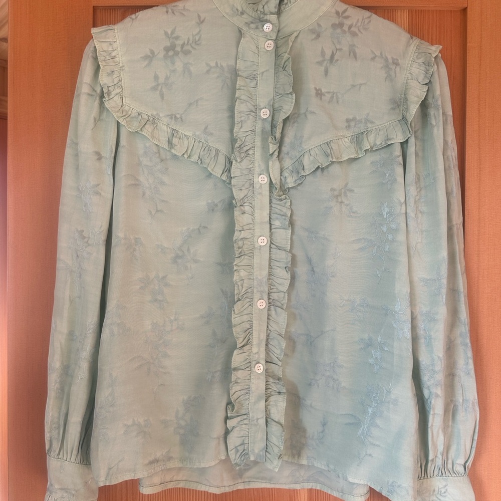 Raquel Allegra Light Blue Ruffle Blouse